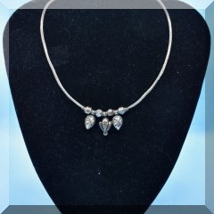 J22. Silvertone braided necklace 15” - $22